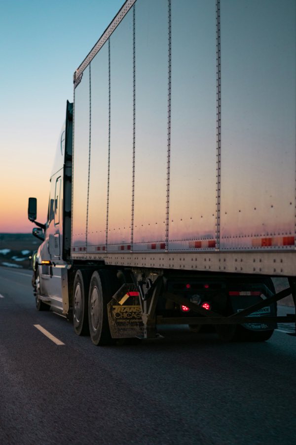 53' dry van trailer on the interstate at dusk